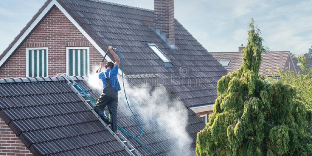 House cleaning with a Pressure washer in winters